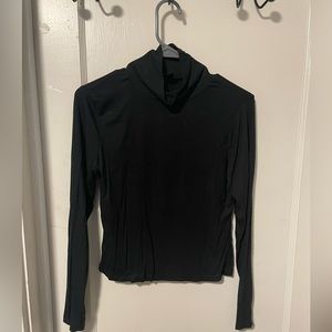Large black turtle neck